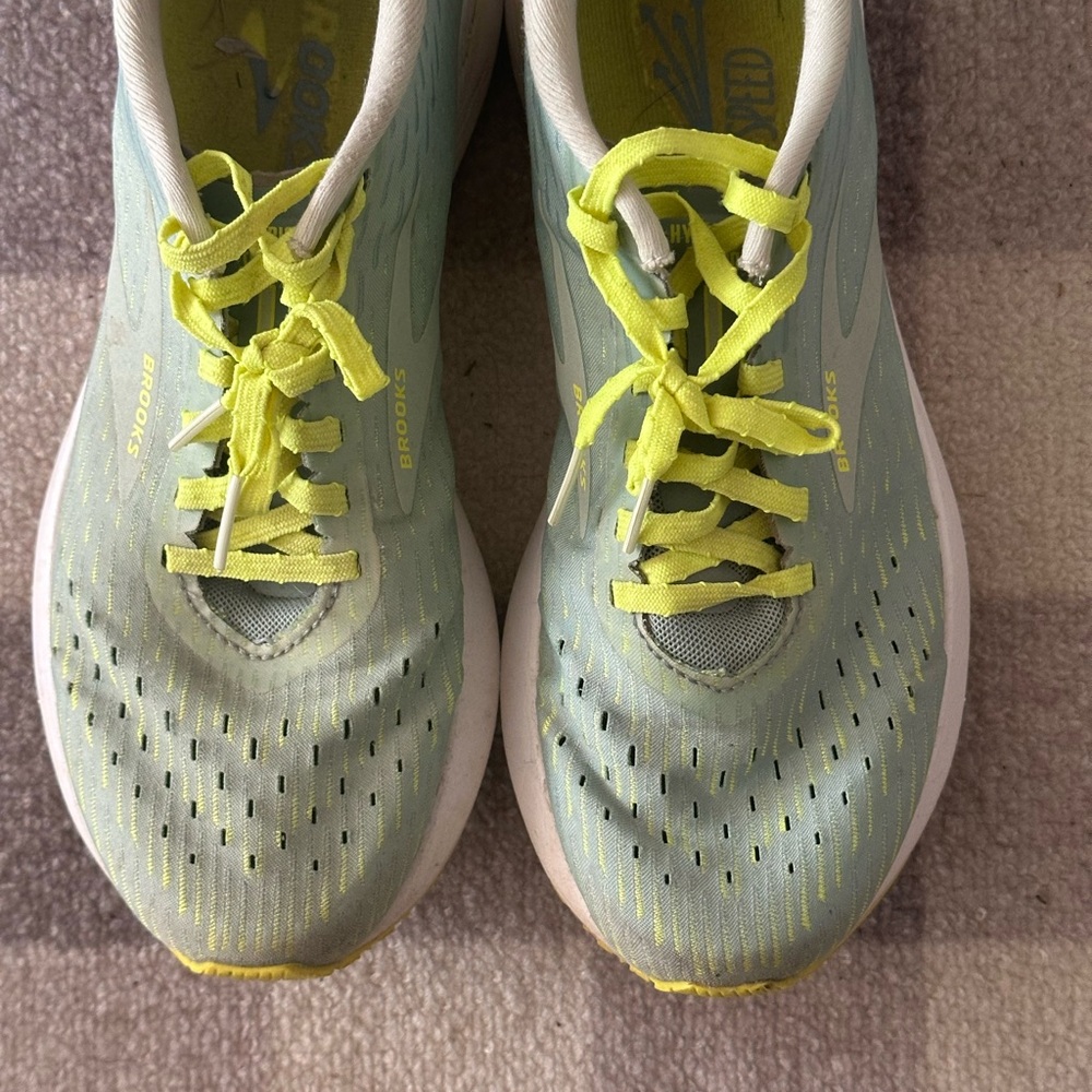 Well loved Brooks Light Blue Running Shoes with Yellow Accents